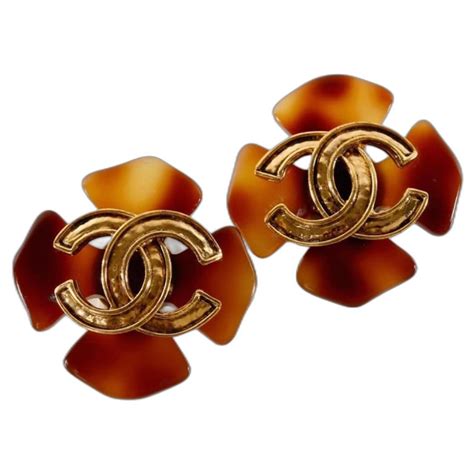 chanel clover cross tortoise shell earrings worth|1994 tortoiseshell.